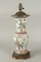 A FINE 19TH CENTURY CHINESE FAMILLE ROSE PORCELAIN VASE CONVERTED TO A LAMP, with painted enamels