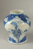 A CHINESE BLUE AND WHITE PORCELAIN PRUNUS VASE, with two panels depicting a vase of flowers and