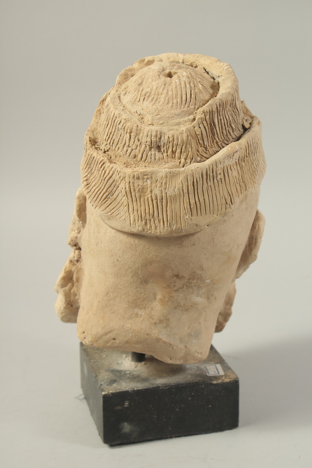 A CARVED CLAY HEAD SCULPTURE, raised on stand. - Image 3 of 4