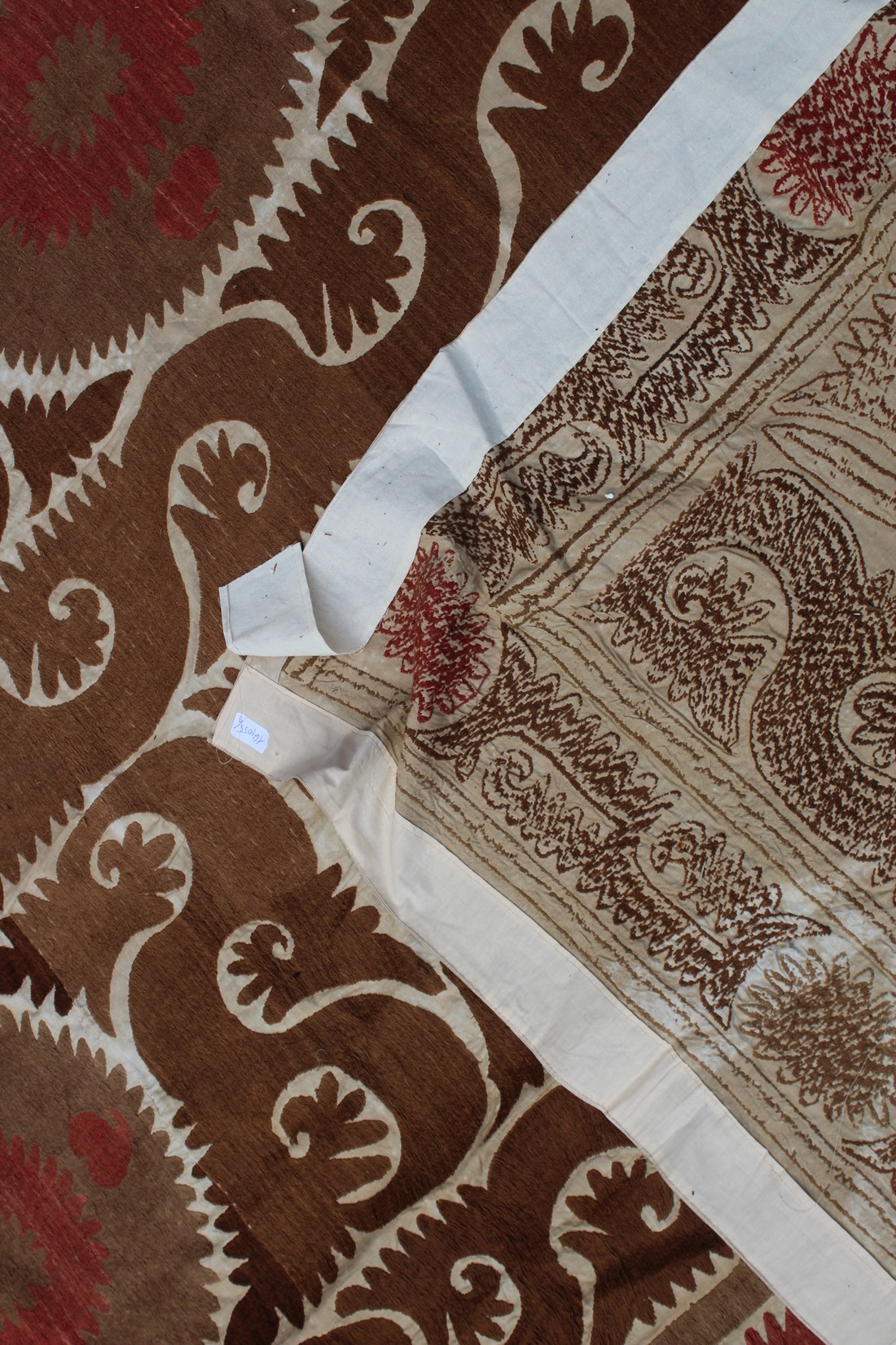 A VERY LARGE 20TH CENTURY SAMARKAND UZBEKISTAN WEDDING SUZANI TEXTILE, in light browns and reds on - Image 7 of 8