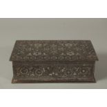 A FINE 19TH CENTURY NORTH INDIAN KOFTGARI SILVER AND GOLD INLAID STEEL BOX, 18cm x 10.5cm.