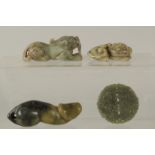 A COLLECTION OF FOUR CHINESE CARVED JADE PIECES, (4).