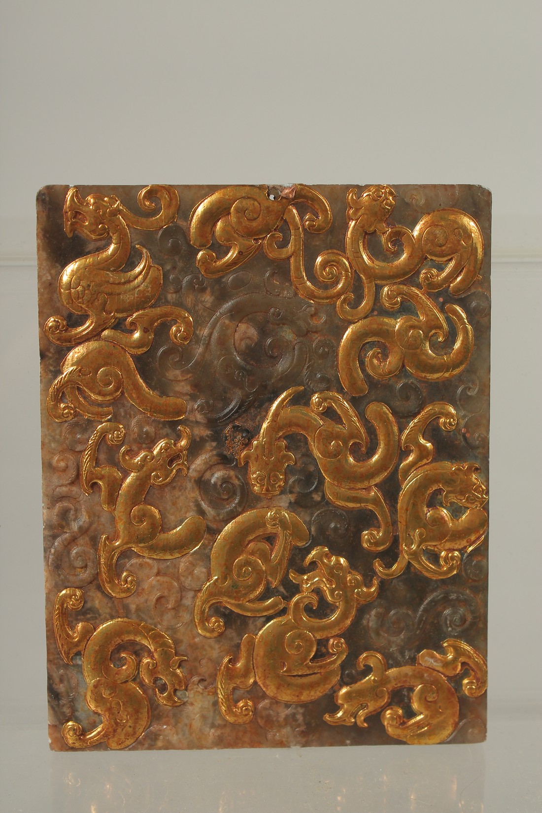 A CHINESE GILDED JADE OR HARDSTONE PLAQUE / PENDANT, 12cm x 9.5cm. - Image 2 of 2