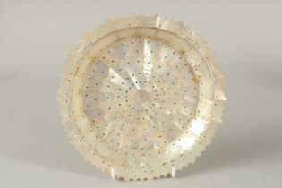 AN INDIAN GOA MOTHER OF PEARL PLATE, 21cm diameter.