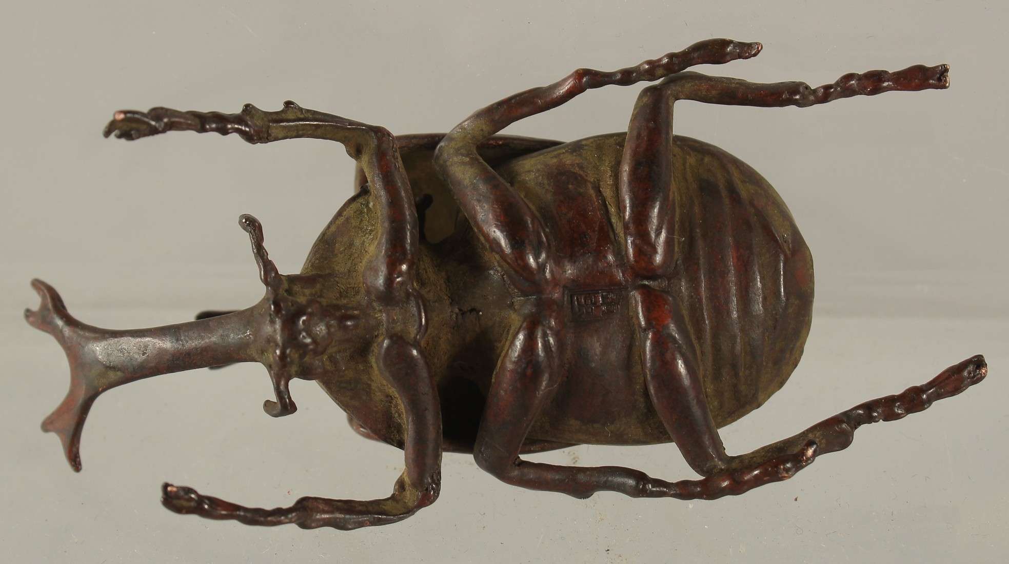 A BRONZE OKIMONO OF A RHINO BEETLE, with removable wings, 9cm long. - Image 2 of 2