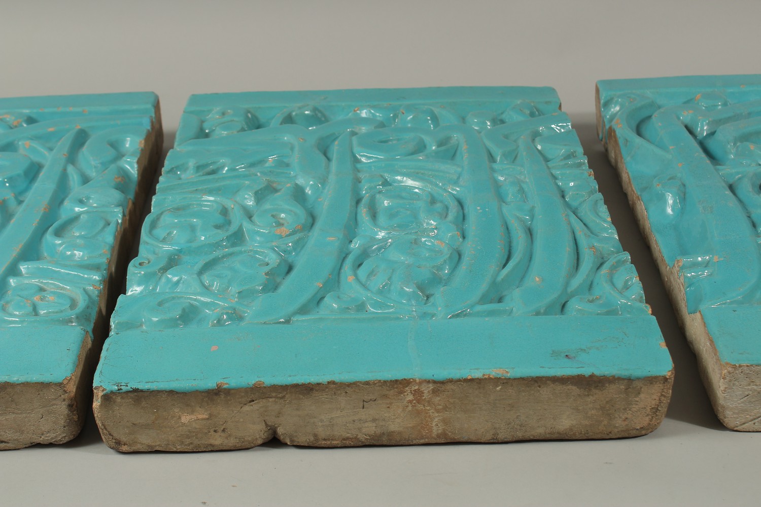 A SET OF THREE LARGE AND RARE PERSIAN OR CENTRAL ASIAN TURQUOISE GLAZED MOULDED CALLIGRAPHIC - Image 8 of 9