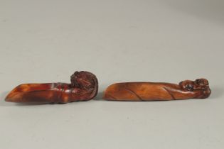 TWO CHINESE CARVED BOXWOOD SCOOPS, one carved with a rooster, the other with a ram, (2).