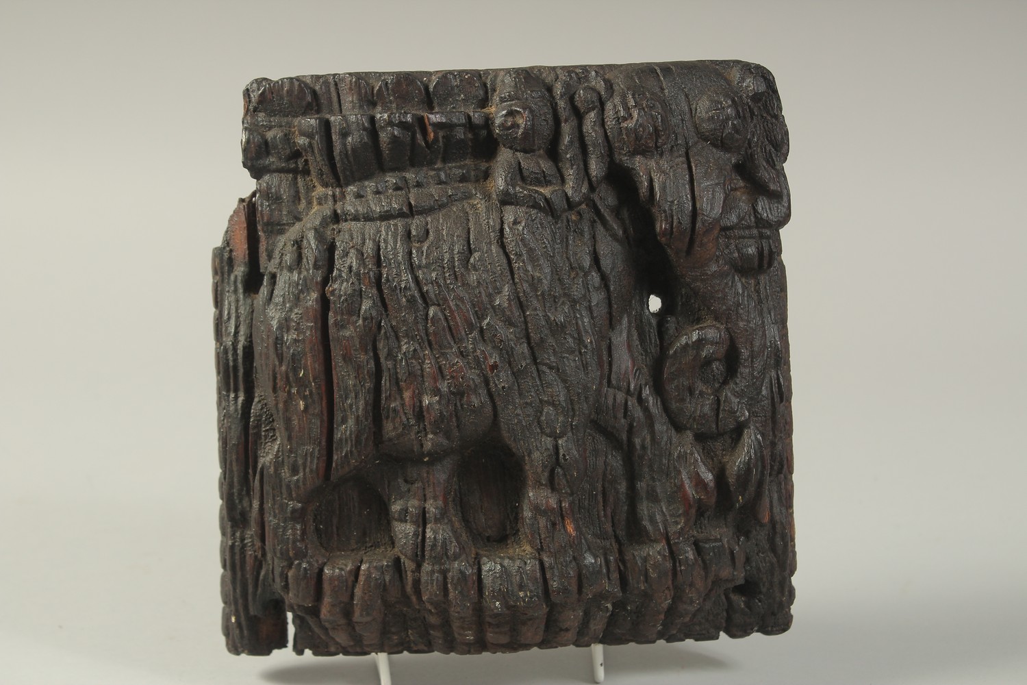 A RARE 14TH-15TH CENTURY INDIAN DECCANI SULTANATE CARVED WOODEN PANEL, depicting an elephant and
