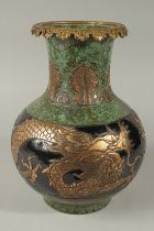 A LARGE 18TH CENTURY CHINIESE QIANLONG DRAGON ZUN VASE, glazed in jade green with gilded dragons,