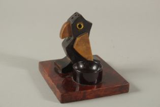 AN EARLY 20TH CENTURY ART DECO DUNHILL STYLE BIRD-SHAPED MATCH HOLDER, with bakelite or cherry amber