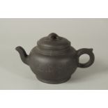 A CHINESE YIXING PURPLE CLAY TEAPOT WITH CARVED CHARACTERS AND RUYI FINIAL, the base with