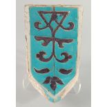 A RARE 14TH CENTURY PERSIAN OR CENTRAL ASIAN TIMURID GLAZED POTTERY MUKARNAS TILE, with turquoise
