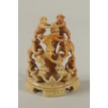 A 19TH CENTURY CHINESE FINELY CARVED SOAPSTONE GROUP DEPICITNG A PYRAMID OF MONKEYS, 11cm high.
