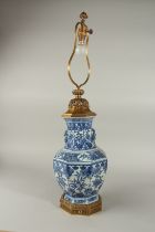 A FINE 19TH CENTURY CHINESE BLUE AND WHITE PORCELAIN OCTAGONAL VASE CONVERTED TO A LAMP, decorated