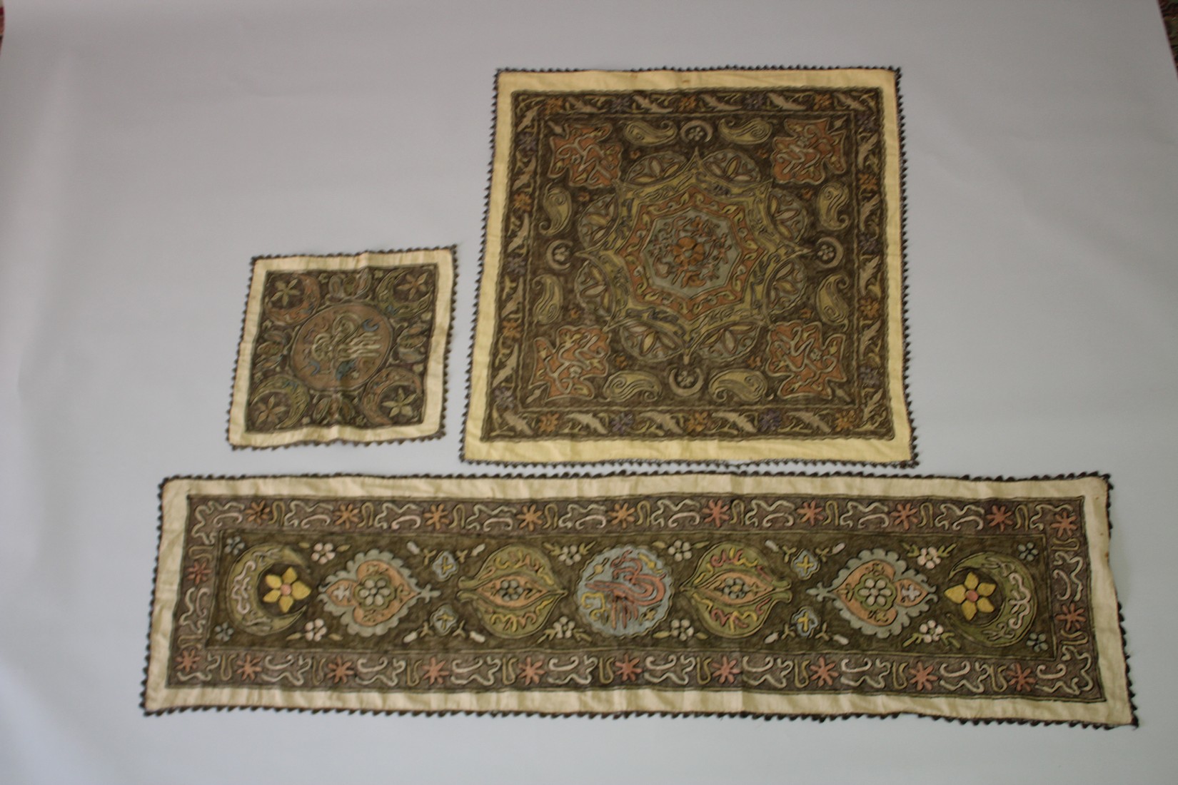 THREE TURKISH OTTOMAN METAL THREAD EMBROIDERED TEXTILES, two displaying Tughra, (3).