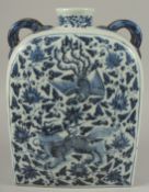 A VERY LARGE CHINESE BLUE AND WHITE PORCELAIN WATER FLASK, with double-twin handles and painted with