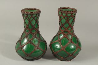 A PAIR OF ANTIQUE JAPANESE AWAJI GREEN POTTERY VASES BY KASHU MINPEI, overlaid with woven bamboo,