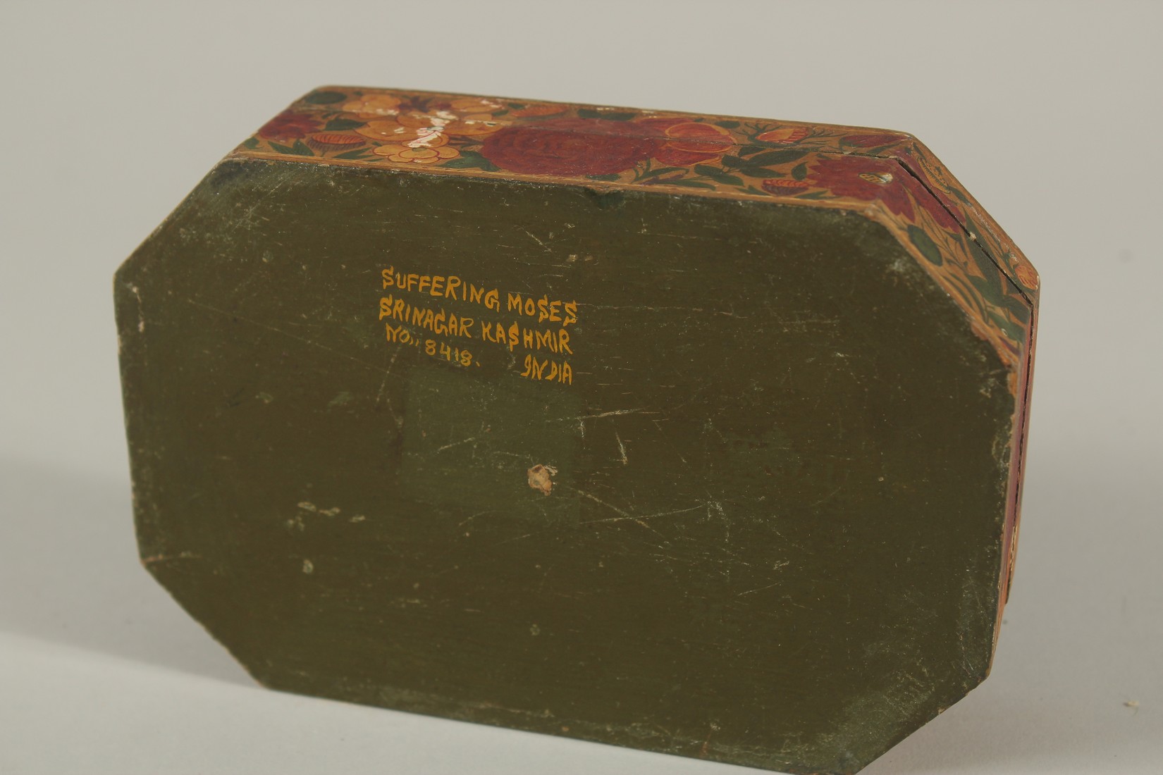 A 19TH CENTURY INDIAN KASHMIRI GILDED AND LACQUERED PAPIER MACHE BOX, SIGNED BY SUFFERING MOSES, - Image 4 of 4