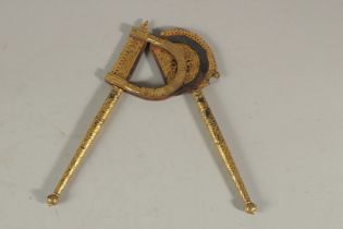 A VERY FINE 18-19TH CENTURY MUGHAL INDIAN GOLD OVERLAID STEEL BETEL NUT CUTTER, 20cm long.