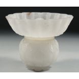 AN 18TH CENTURY INDIAN MUGHAL CARVED WHITE JADE LIDDED BOWL, carved with foliate motifs and petal