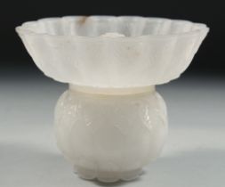 AN 18TH CENTURY INDIAN MUGHAL CARVED WHITE JADE LIDDED BOWL, carved with foliate motifs and petal