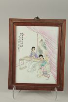 A VINTAGE JAPANESE PORCELAIN TILE DEPICTING FEMALE MUSICIANS, inset within a cherry wood frame, 36cm