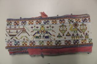 AN EARLY 20TH CENTURY WESTERN INDIAN GUJARAT LONG BEADWORK PANEL, with polychrome stylised geometric