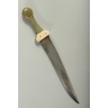 A FINE AND LARGE INDIAN JADE AND BONE HILTED DAGGER, with watered steel blade, 40cm long.