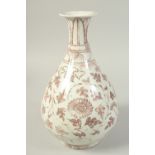 A CHINESE UNDERGLAZE PORCELAIN YUHUCHUN VASE, decorated with flower heads and vines, 33cm high.