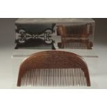 A FINELY CARVEEDD LARGE 19TH CENTURY PERSIAN QAJAR WOODEN COMB, with calligraphy, together with