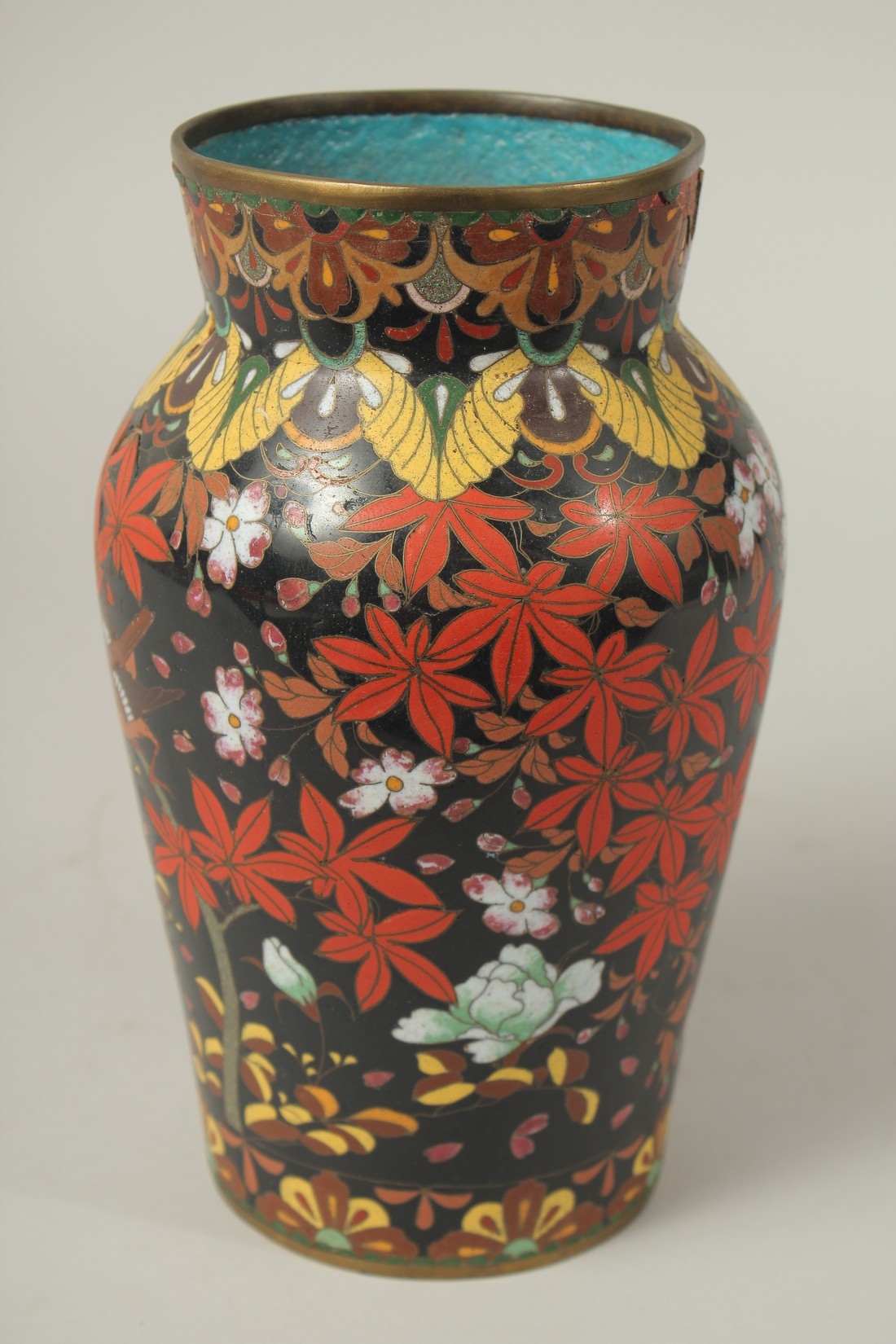 A CHINESE BLACK GROUND CLOISONNE VASE, decorated with birds and flora, (af), 24cm high. - Image 2 of 6