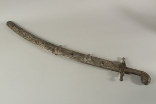 A LARGE AND HEAVY OTTOMAN BALL AND WHITE METAL SWORD'S HILT AND SCABBARD, hilt 19cm long, scabbard