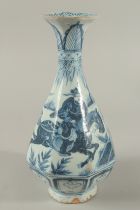 A CHINESE BLUE AND WHITE PORCELAIN VASE, with figures on horseback, 30cm high.