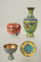 A COLLECTION OF FOUR CHINESE CLOISONNE ITEMS: comprising a dragon vase, a stem cup, a lidded