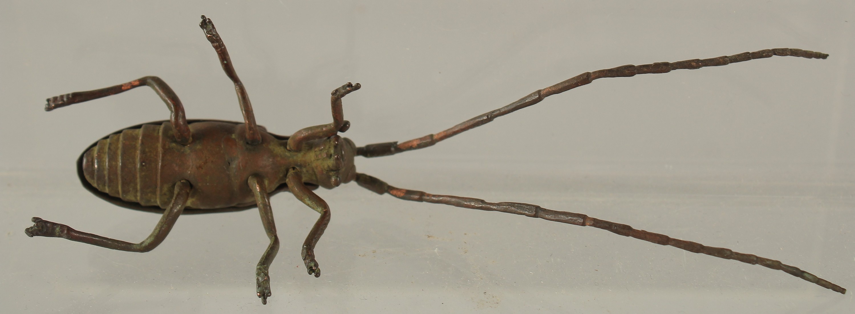 A BRONZE OKIMONO OF A LONGHORN BEETLE, 13cm long. - Image 2 of 2