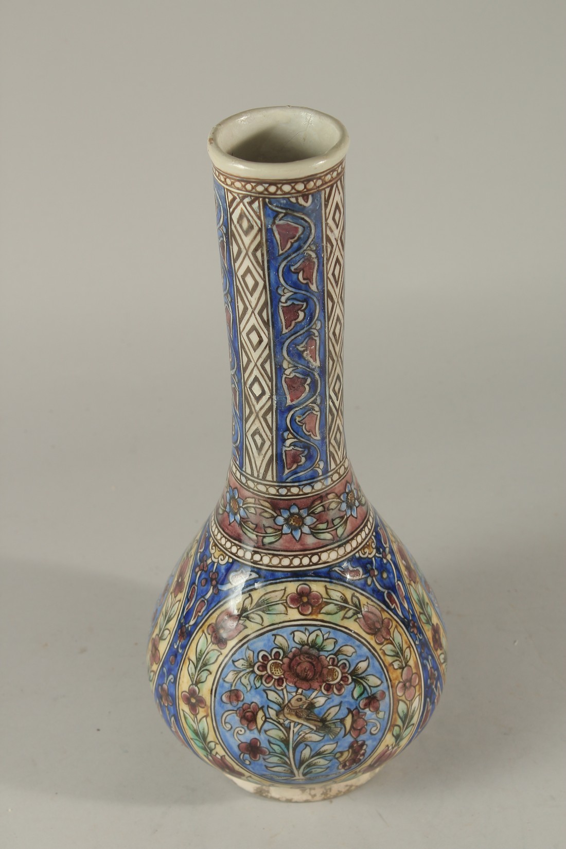 A PERSIAN QAJAR GLAZED POTTERY VASE, painted with panels depicting a bird amongst flora, further - Image 3 of 5