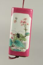 AN UNUSUAL CHINESE FAMILLE ROSE PORCELAIN INRO, the inner case painted with erotic scenes, (small