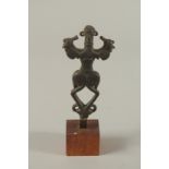 A FINE AND RARE ANCIENT PERSIAN LURISTAN BRONZE IDOL, mounted to a wooden base, figure 12cm.
