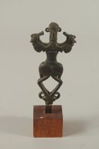 A FINE AND RARE ANCIENT PERSIAN LURISTAN BRONZE IDOL, mounted to a wooden base, figure 12cm.