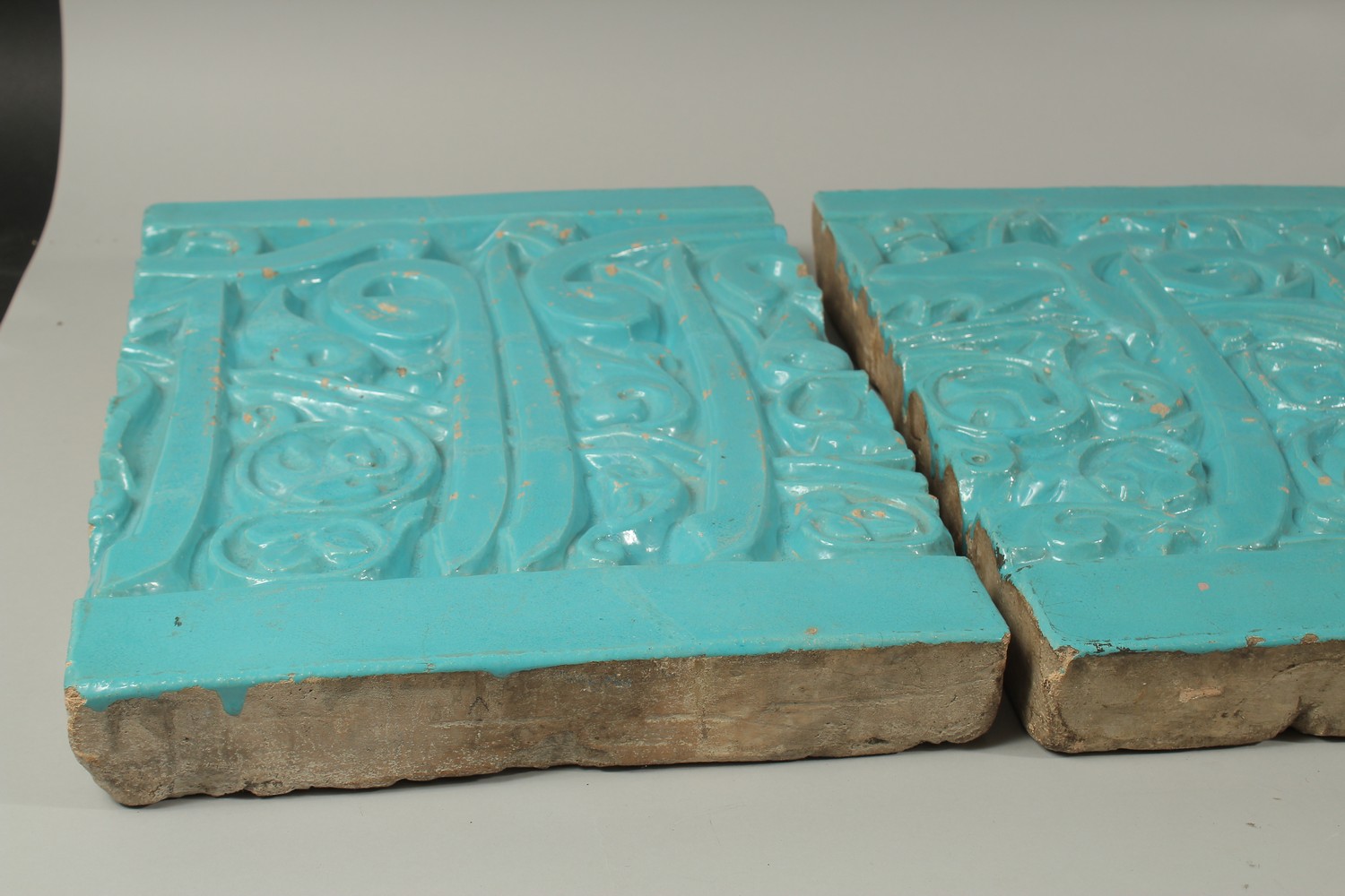 A SET OF THREE LARGE AND RARE PERSIAN OR CENTRAL ASIAN TURQUOISE GLAZED MOULDED CALLIGRAPHIC - Image 7 of 9