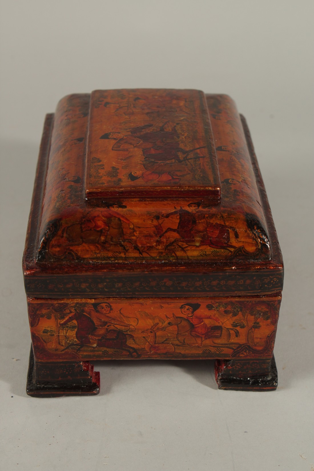 A FINE 19TH CENTURY PERSIAN QAJAR PAINTED AND LACQUERED PAPER MACHE BOX, raised on four feet, 18cm x - Image 2 of 6