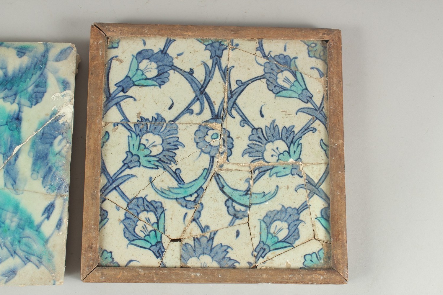 TWO EARLY 17TH CENTURY OTTOMAN IZNIK BLUE AND WHITE GLAZED POTTERY TILES, each approx. 25cm - Image 3 of 4