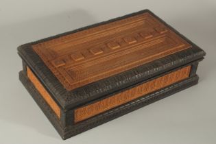 A VERY FINE LARGE 19TH CENTURY SRI LANKAN EBONY AND POSSIBLY SANDALWOOD ENGRAVED CASKET, 40cm x 24cm