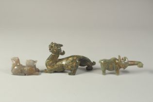 A COLLECTION OF THREE GILDED CARVED JADE ANIMALS / BEASTS, (3).