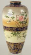 A FINE JAPANESE GILDED COBALT BLUE SATSUMA VASE, painted with panels of birds and flora, character