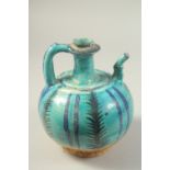 A PERSIAN KASHAN TURQUOISE GLAZED POTTERY EWER, 20cm high.