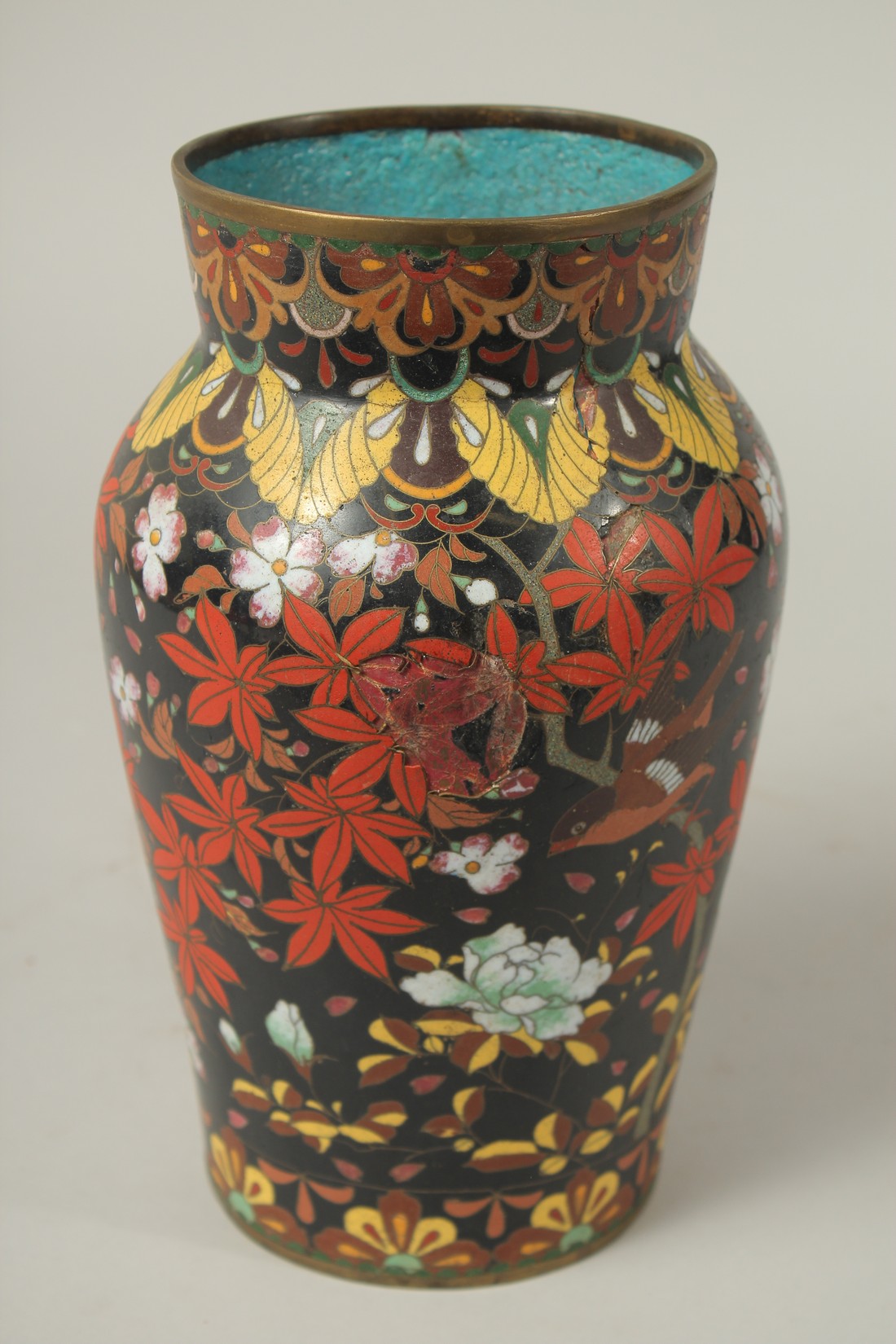 A CHINESE BLACK GROUND CLOISONNE VASE, decorated with birds and flora, (af), 24cm high. - Image 3 of 6