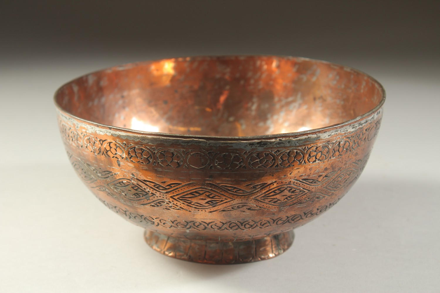 A 19TH CENTURY QAJAR ENGRAVED TINNED COPPER BOWL, 19.5cm diameter. - Image 3 of 5