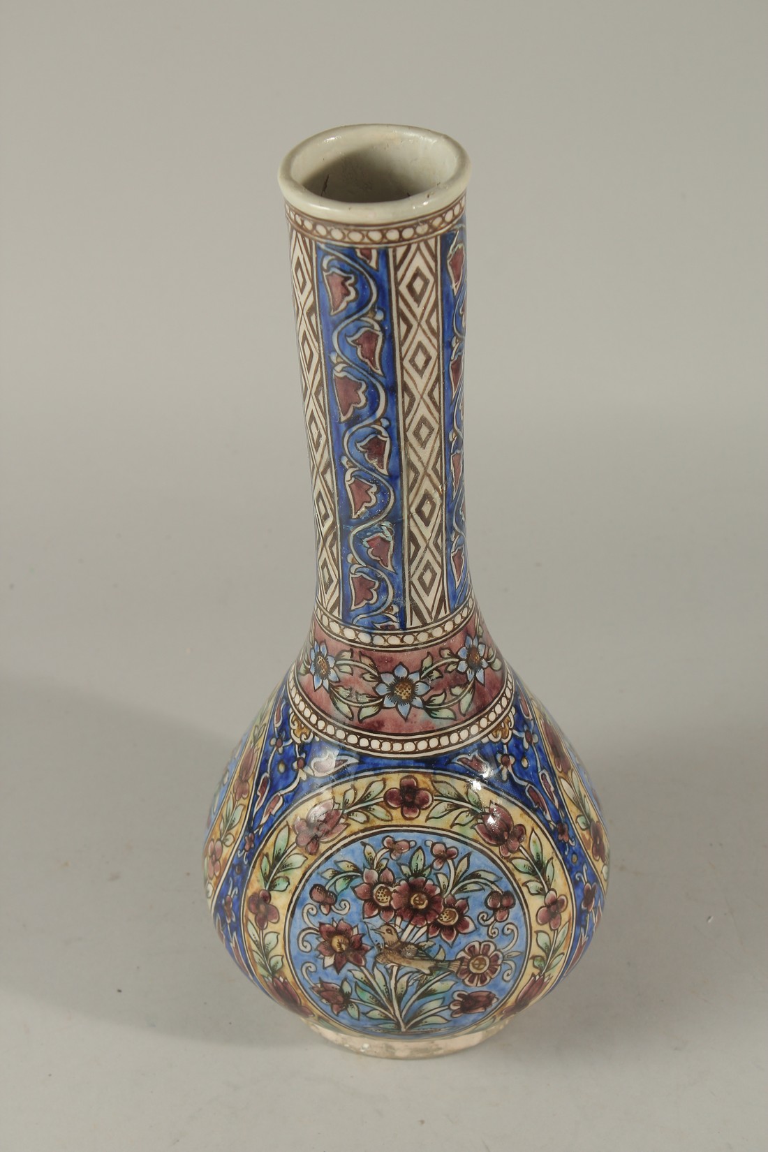 A PERSIAN QAJAR GLAZED POTTERY VASE, painted with panels depicting a bird amongst flora, further - Image 2 of 5