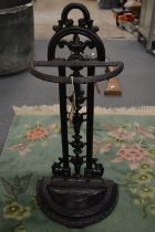 A small cast iron stick stand.